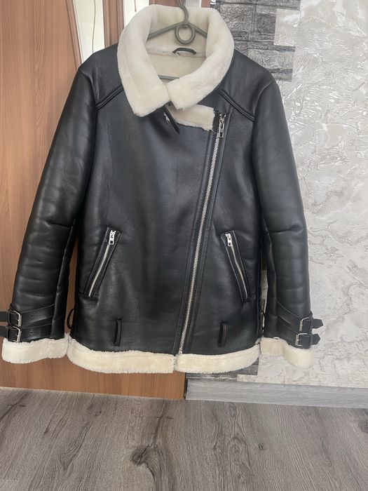 Жіноча дублянка подовжена