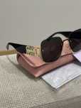 oculos miumiu em caixa