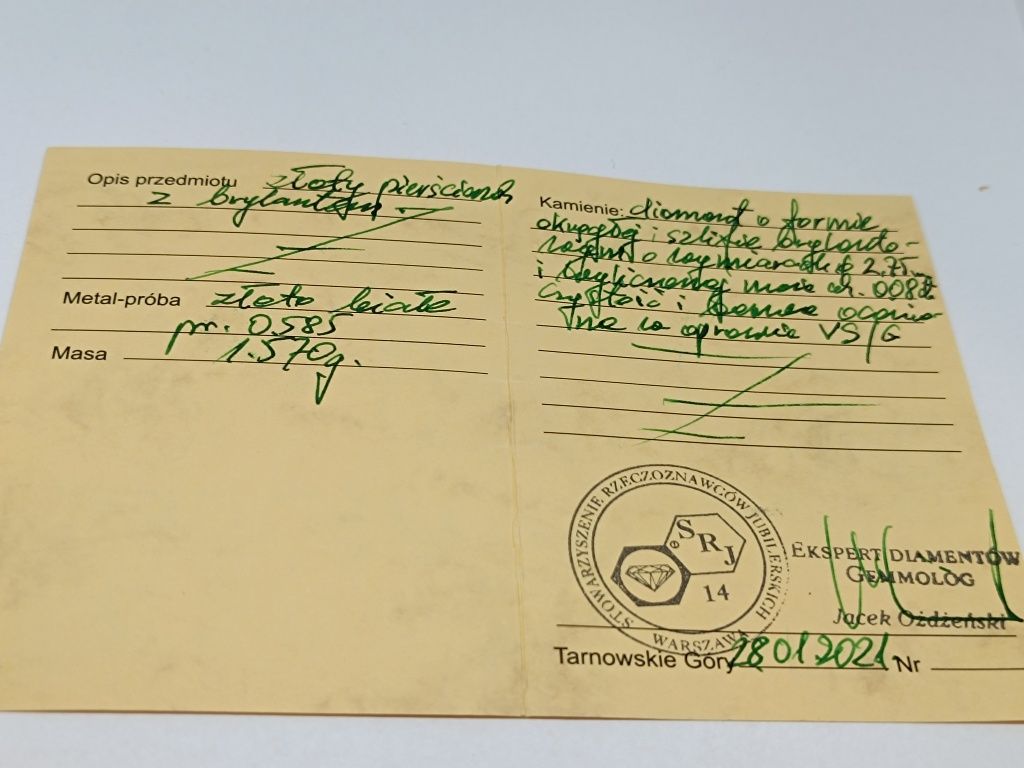 Złoty pierścionek z białego złota z brylantem roz. 11, złoto próby 585