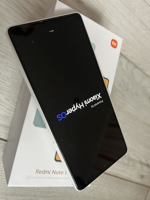 Redmi Note 13 5G w idealnym stanie na gwarancji.