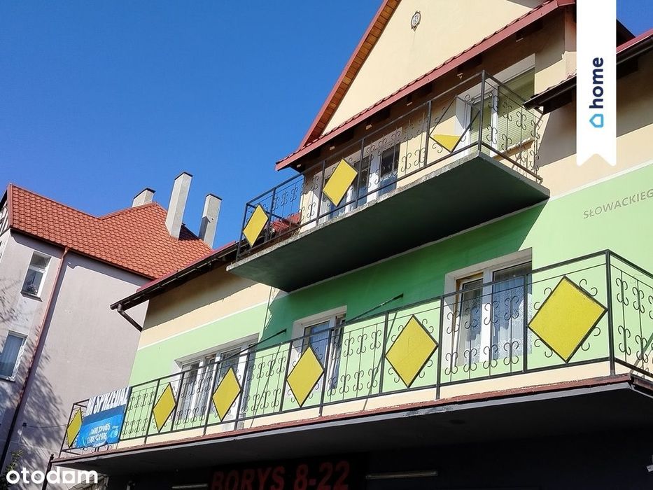 Dom z działalnością handlowo - usługową.