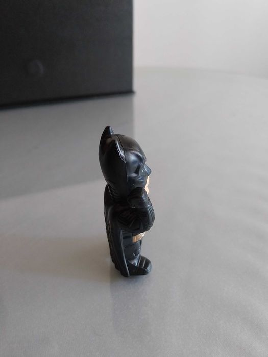 Figura de ação do personagem Batman, em muito bom estado