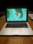 MacBook Air 13 256 GB A1466 + Magic Mouse 2 i obudowa TUCANO