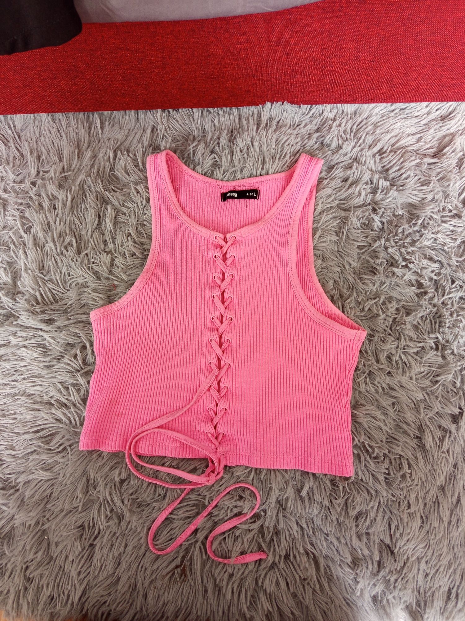 Crop top z wiązaniem na biuście L Sinsay