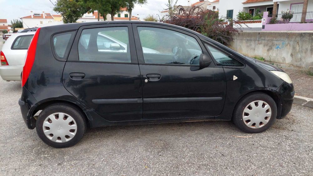 Mitsubishi Colt 1.1 2007 – Económico, fiável e em bom estado