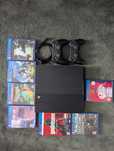 Playstation 4 + 2 pady z 7 grami.