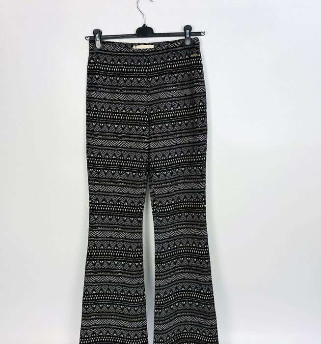 Wzorzyste spodnie dzwony boho M 38