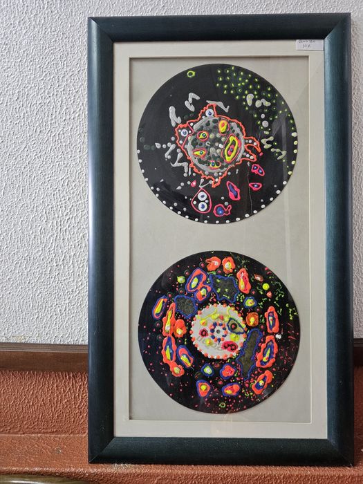 Vendo quadro com discos de vinil