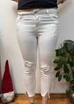 Białe spodnie jeansowe skinny z dziurami rozdarciami jeansy Zara 36 S