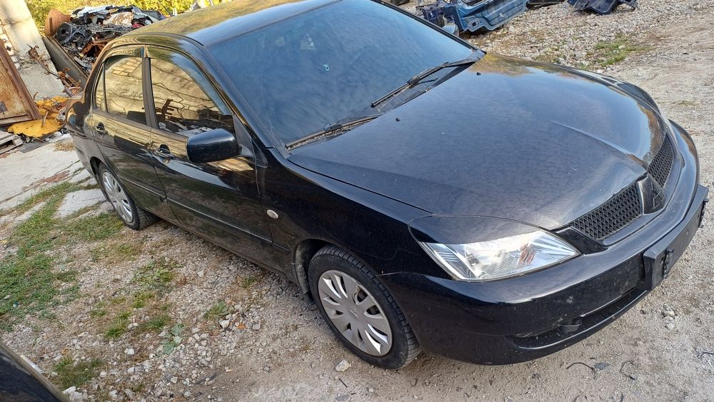 Разборка Mitsubishi Lancer 9 ланцер дверь крыло четверть  запчасти