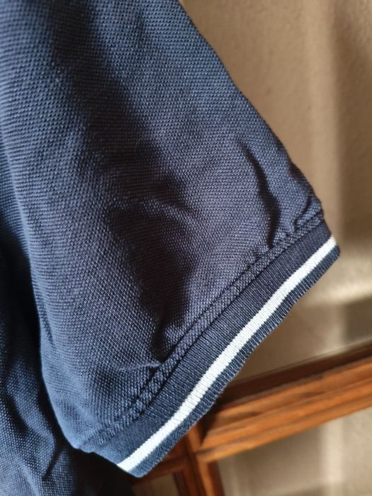 Polo azul marinho da marca Tiffosi