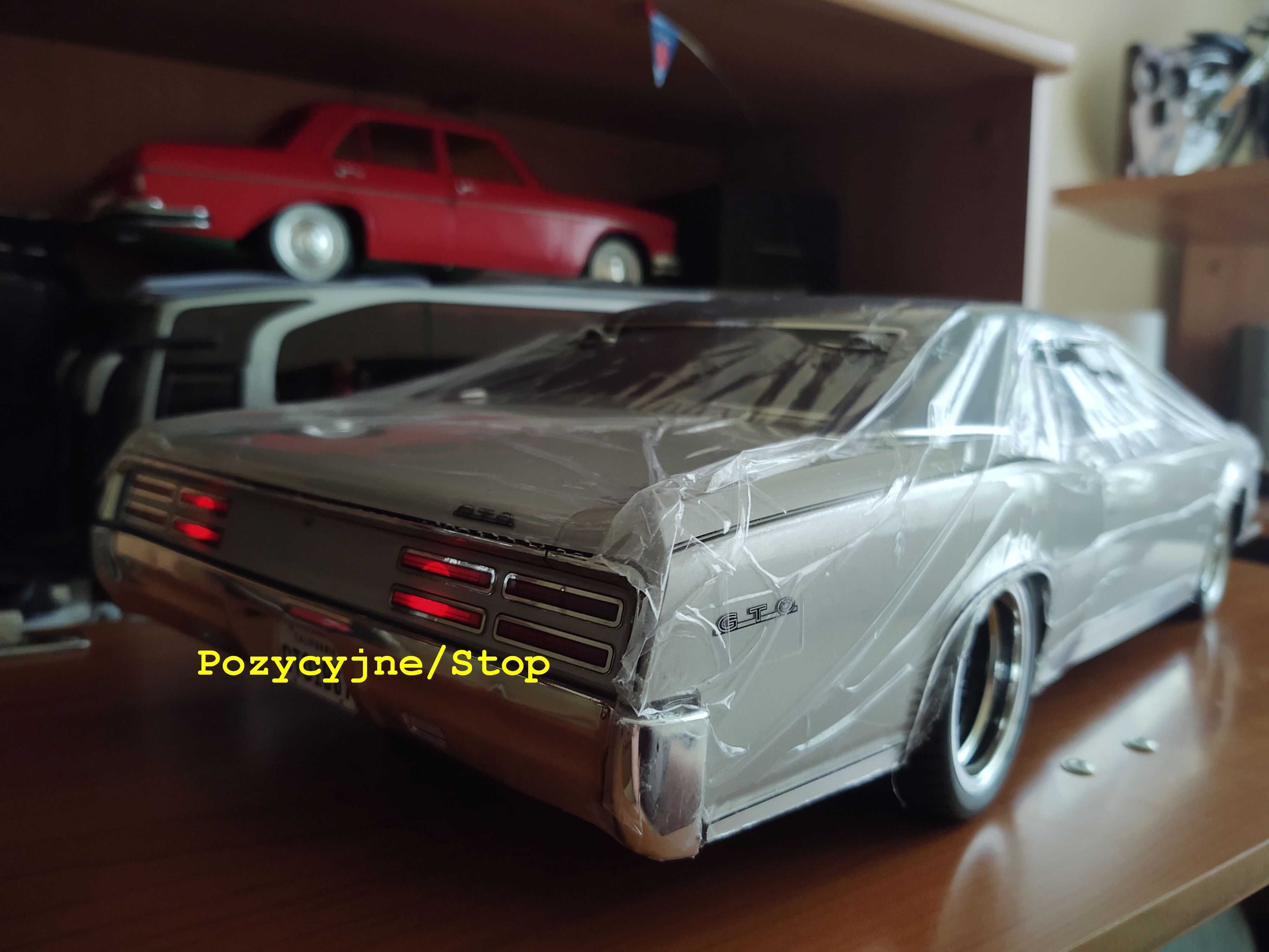 Pontiac GTO 1967 RTR KYOSHO skala 1:10 4WD Oświetlenie.Fabr Nowy.