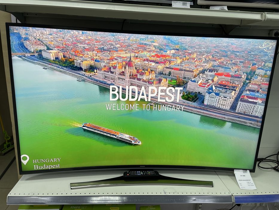 Вигнутий телевізор Samsung 65 б/в; стан нового; гарантія 1 рік