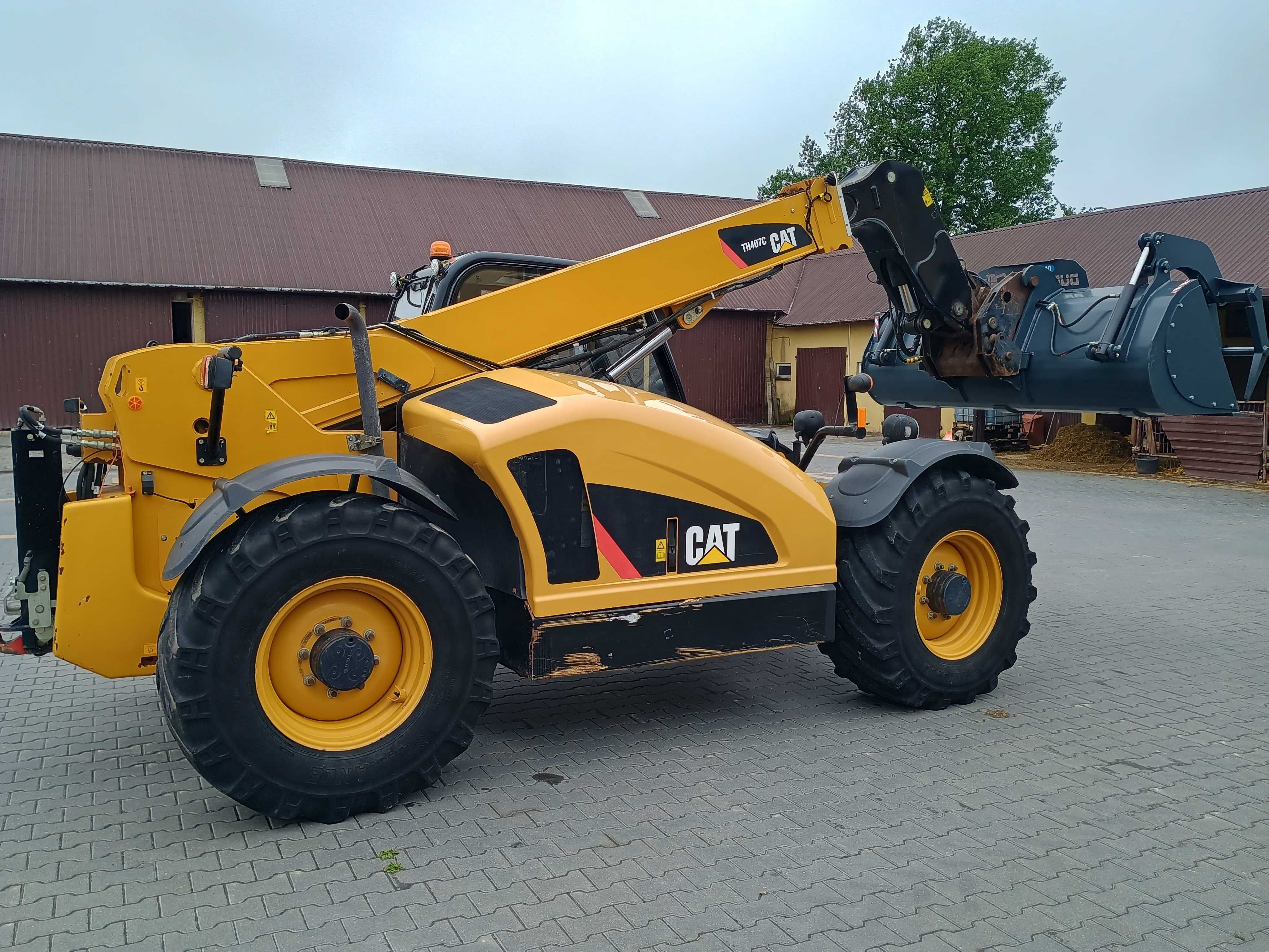 Ładowarka teleskopowa Caterpillar CAT TH 407 rok 2014
