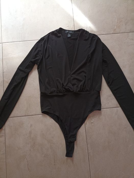 Продам спідницю  і боді чорне