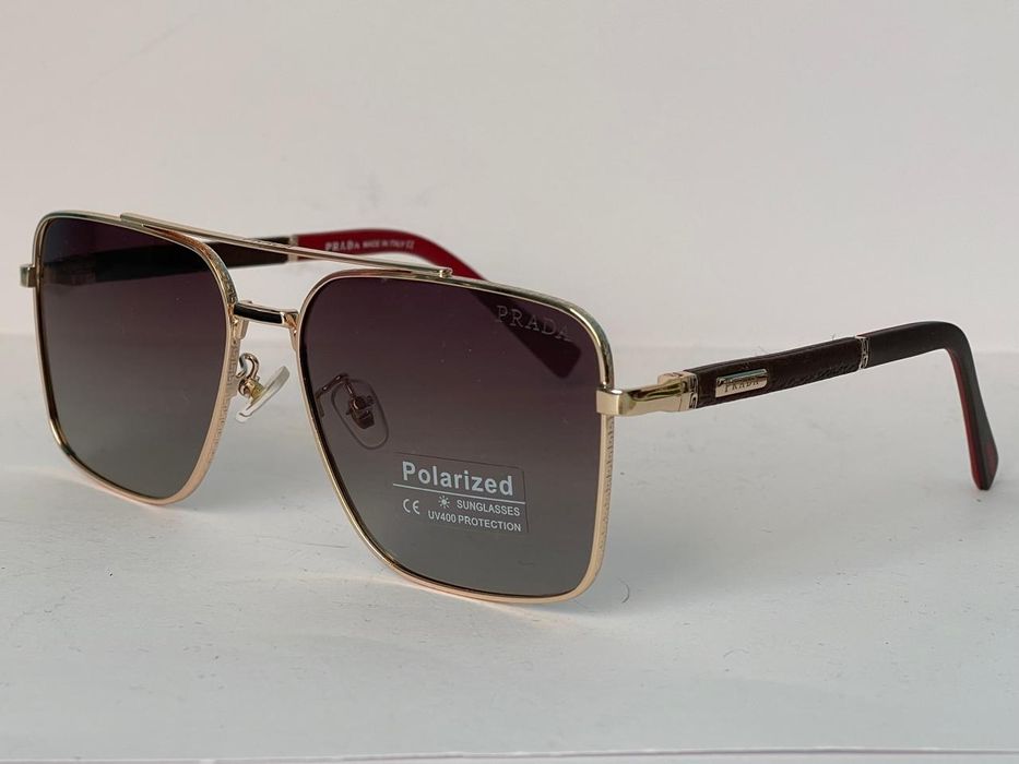 PRADA męskie okulary przeciwsłoneczne polaryzacyjne złote nowe