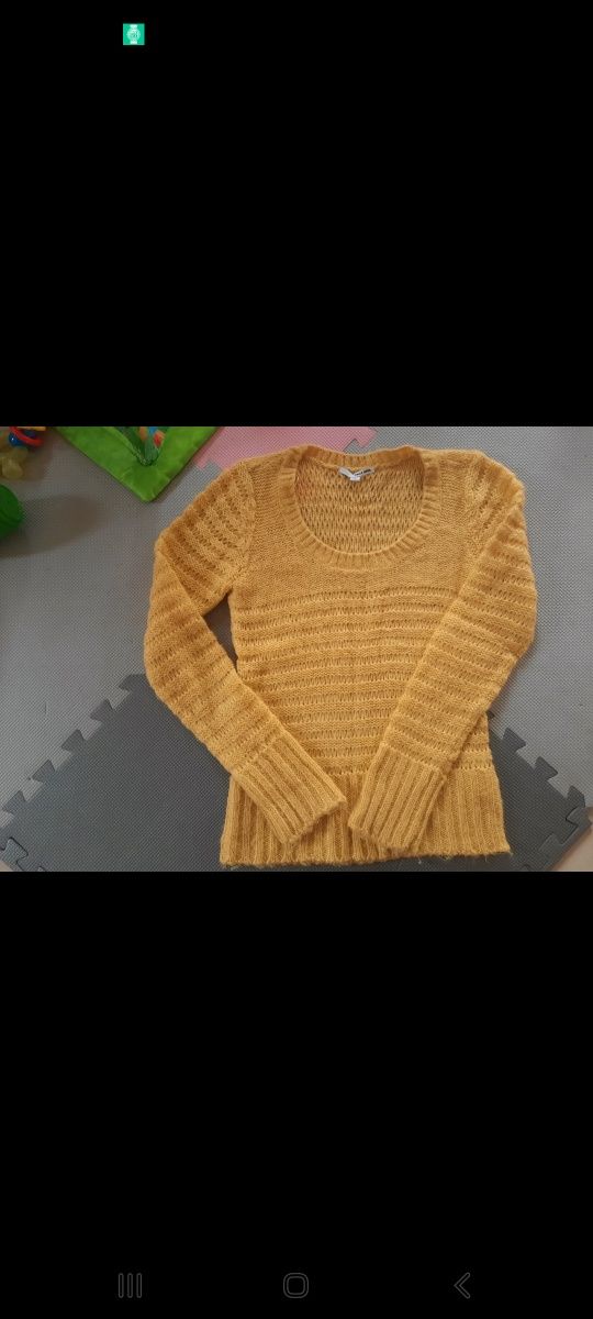 Piekny żółty akrylowy sweterek 38