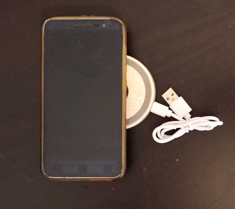 Wireless Mobile Phone Charger (new, with packaging)64284550756225120