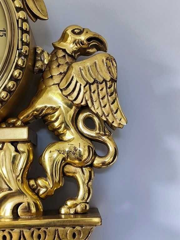 Zegar kartelowy - Svenskt Runa - zdobiony gryfami - złocony .