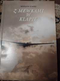 Z mewkami w klapie