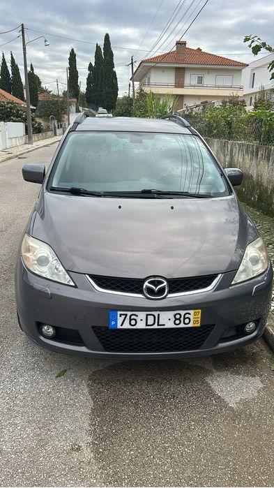 Mazda 5, 7 lugarea paga selo antigo