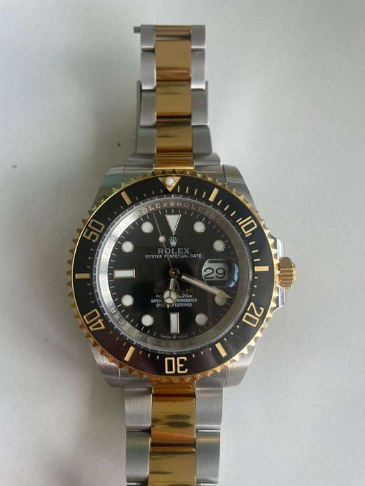 Zegarek Rolex czarno-złoty, stan doskonały