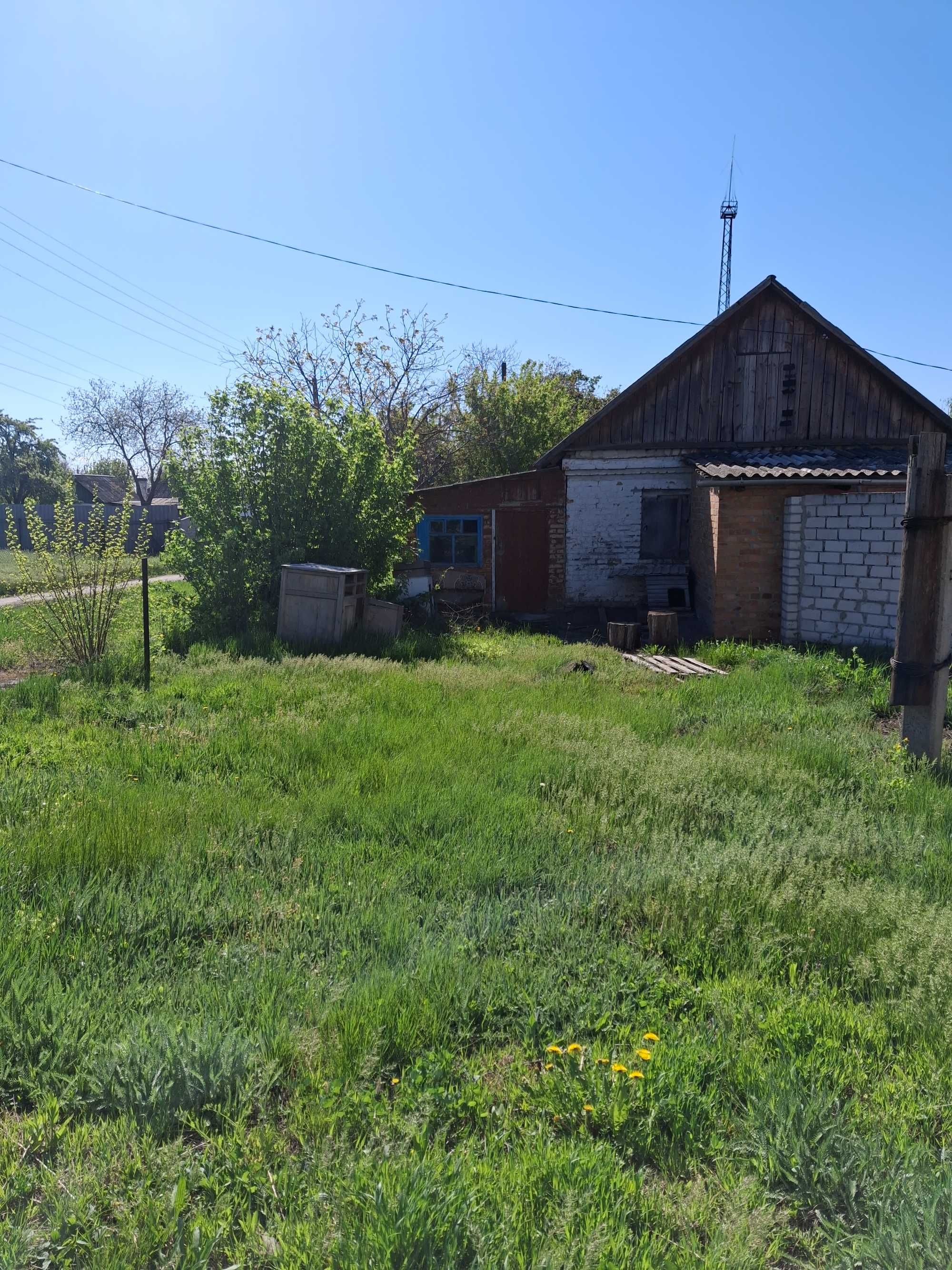 Продам будинок /4-х кімнатну квартиру
