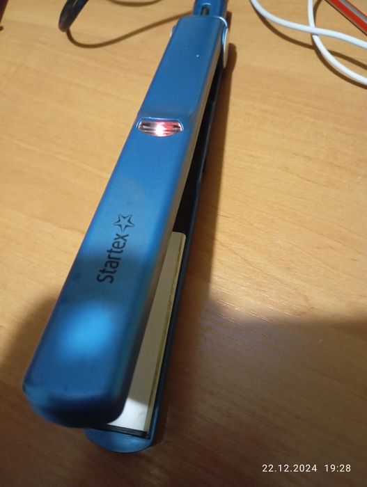 Утюжок та плойка