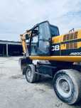 Екскаватор колісний JCB js200w продаж