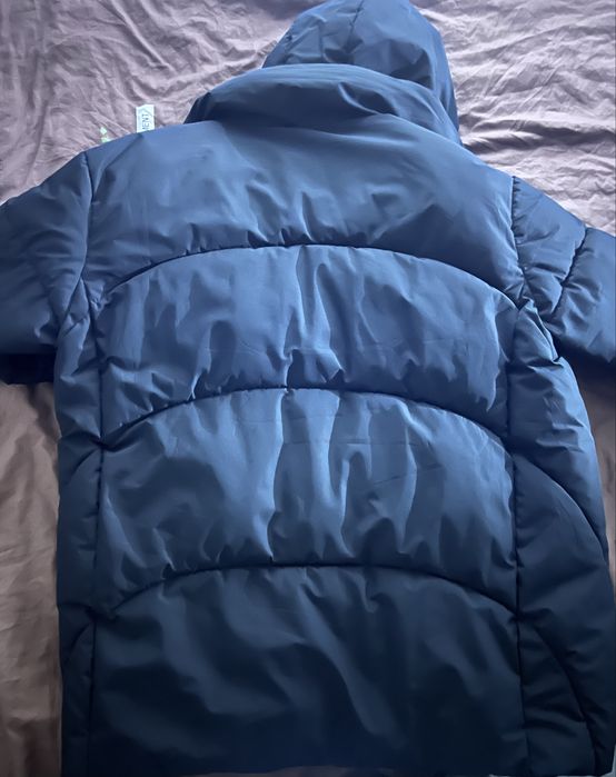 Зимова жіноча куртка розмір 48