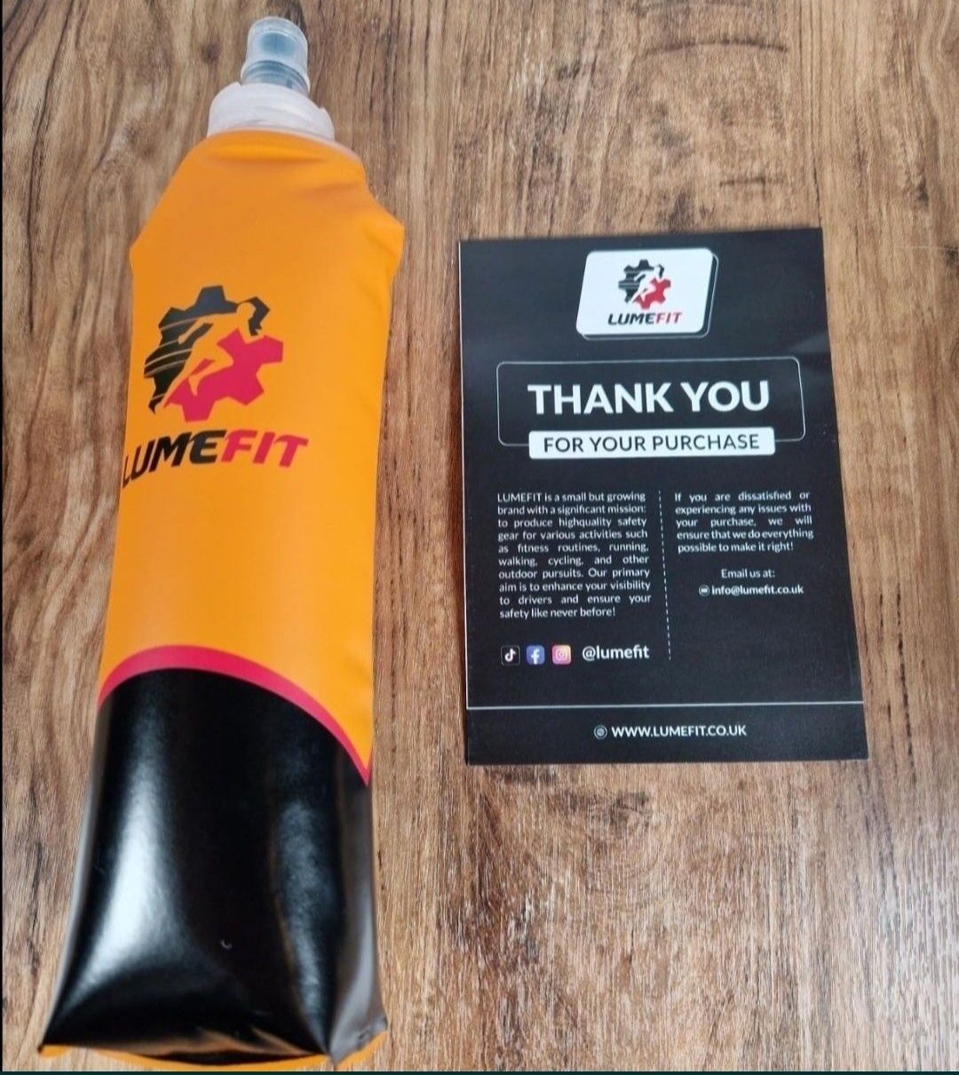 LUMEFIT kamizelka do biegania - odblaskowa z 500ml składaną butelką