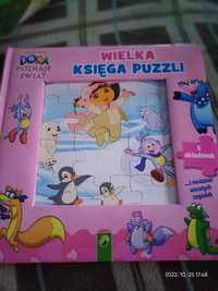 Książka wielka księga puzzli- Dora poznaje świat