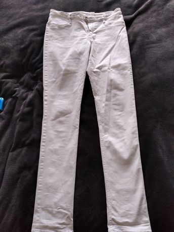 Białe spodnie jeansowe dla dziewczynki H&M roz 170