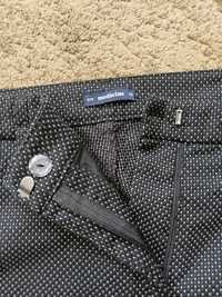 Eleganckie spodnie czarne w kropeczki  40/42 XL