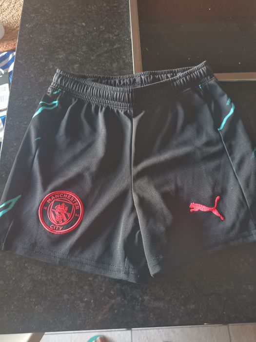 Calções Puma equipamento Manchester city 5/6anos 
Equipamento Manchest