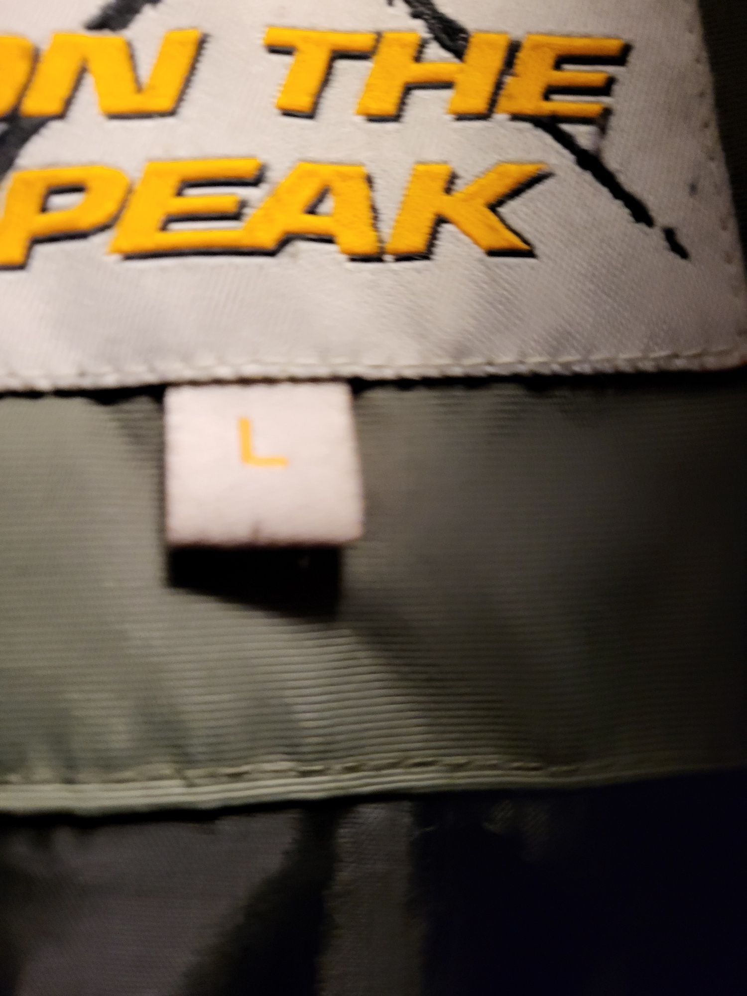 Khaki parka On The Peak