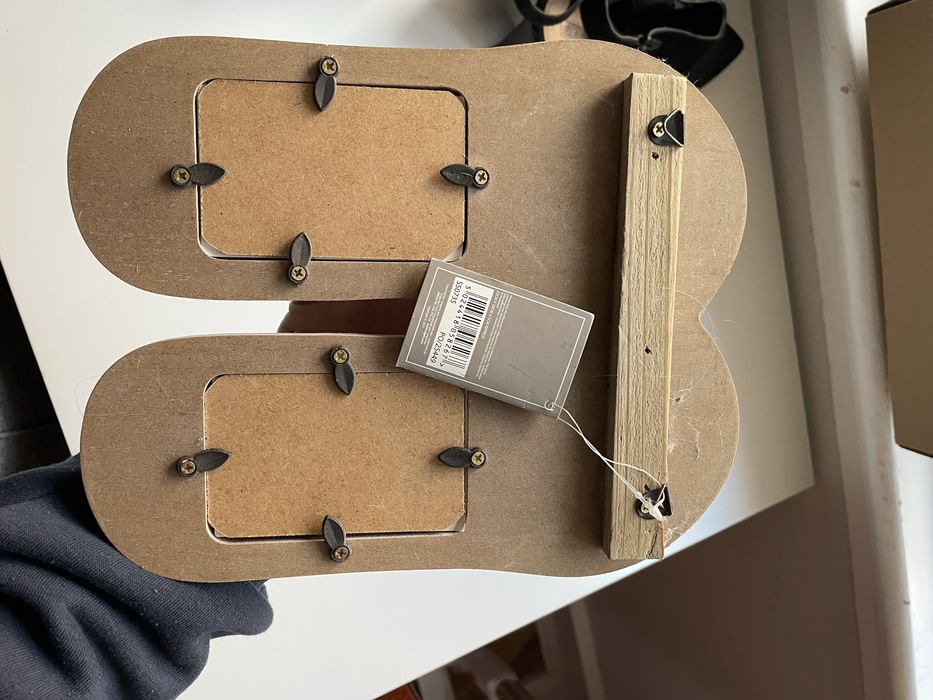 Moldura em forma de chinelo