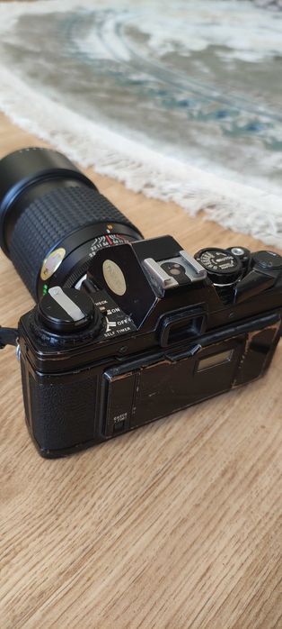 Sprzedam aparat lustrzanka analogowa OLYMPUS om10 + obiektyw f 200mm.