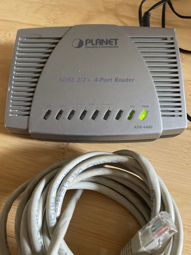 ADSL 2/2+ 4 -port router Planet