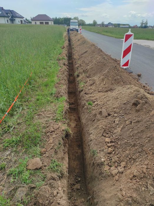 Usługi minikoparką, koparką łańcuchową, przeciskiem-kretem