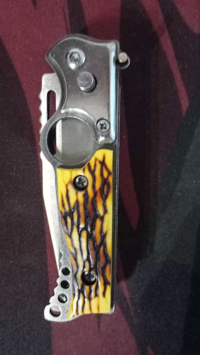 Nóż składany sprężynowy