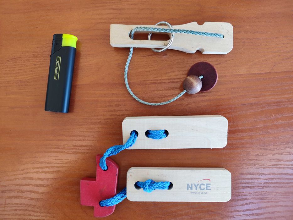 Головоломка деревянная с веревкой