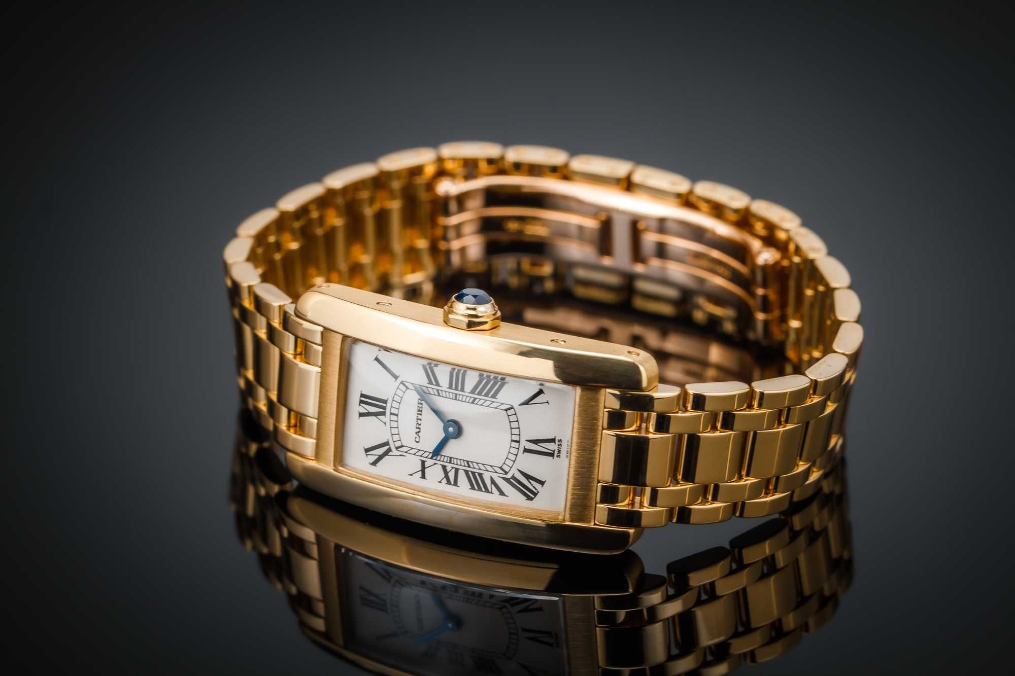 złoty zegarek Cartier Tank Americaine 18karatowe złoto