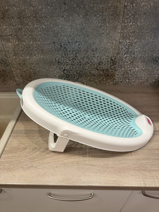 Leżaczek do kąpieli Okbaby Turkusowy składany higieniczny OK BABY