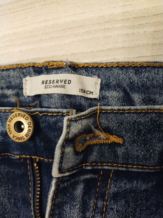 Spodnie dziewczęce dżinsy rurki Reserved r. 158