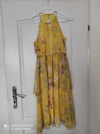 Sukienka żółta w kwiaty. Rozmiar 38, M. Z Londynu.