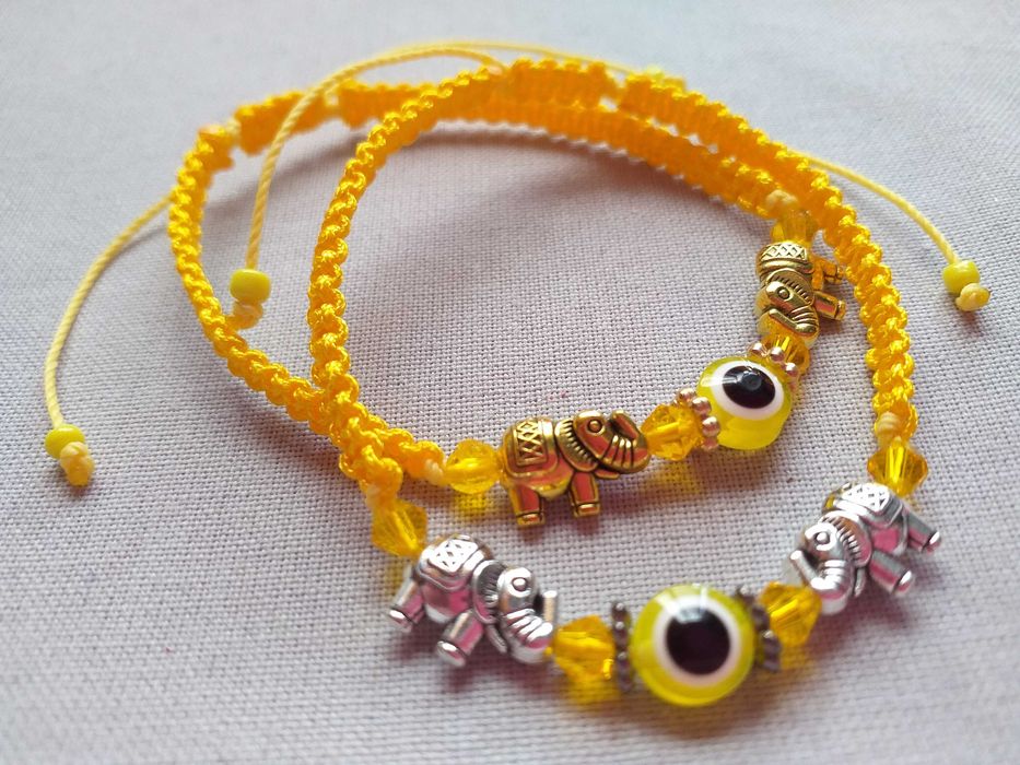 Pulseira em Macramê Olho Turco entre Elefantes Laranja