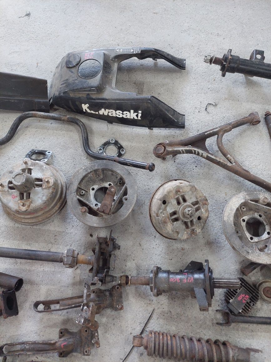 Kawasaki klf 300 amortyzator wahacz alternator bęben kolumna  piasta