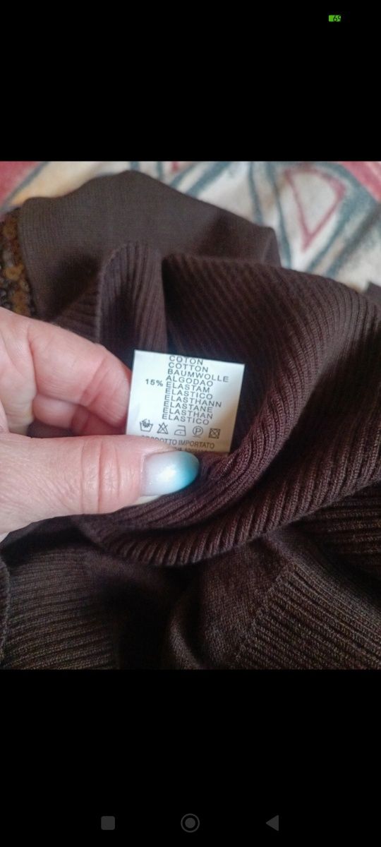 Swetry z wszyta kamizelka w cekiny