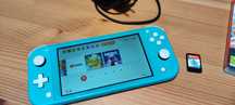 Nintendo Switch Lite + dwie gry